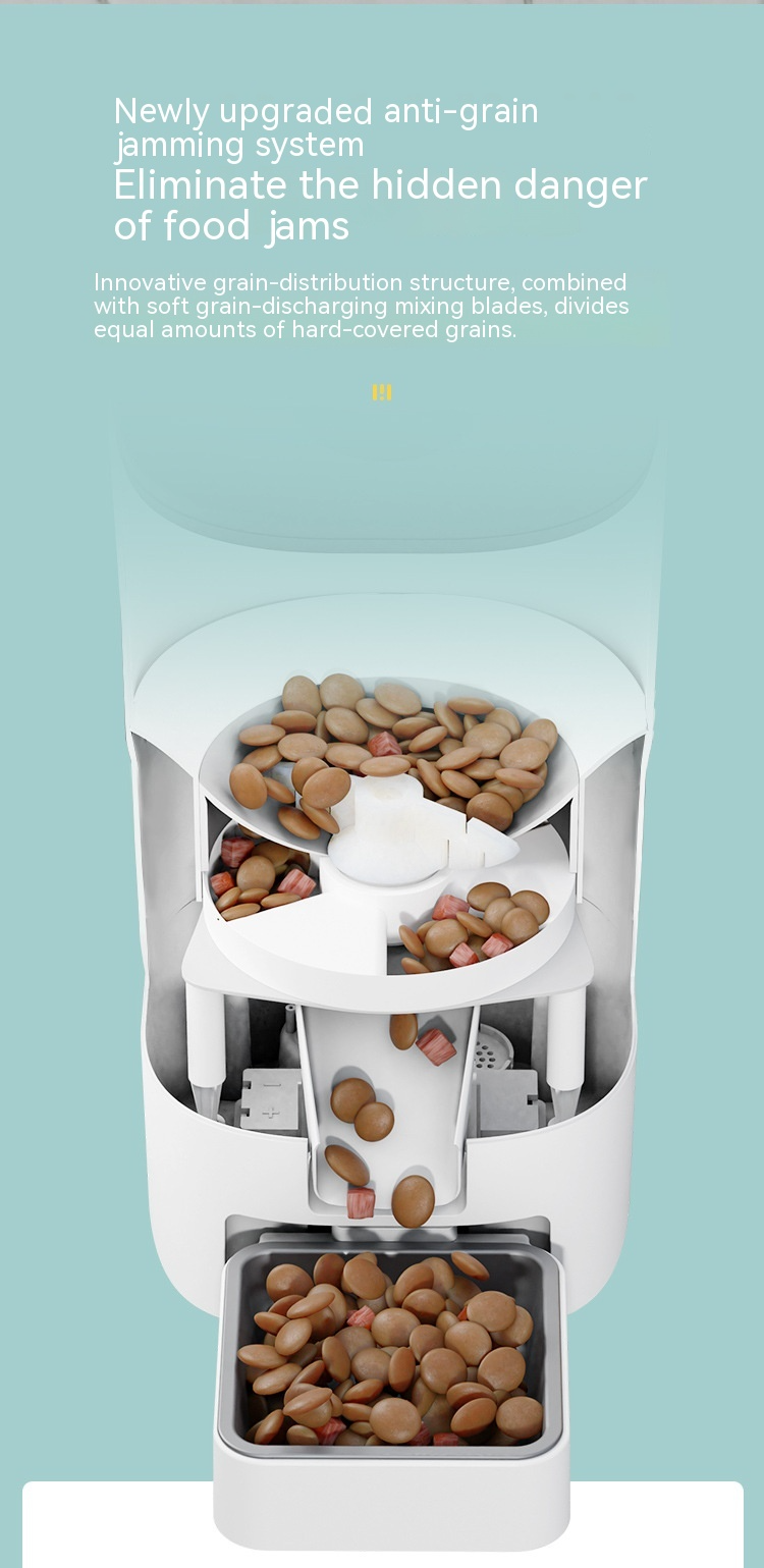 Dog eating from automatic smart feeder bowl tray
